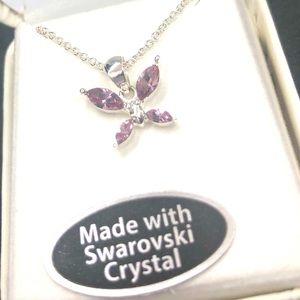 NWT rhodium plated Swarovski pink crystal necklace. I also have a blue crystal.